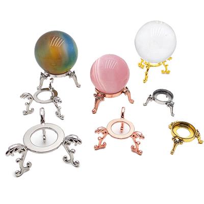 Crystal balls on metal ring stands